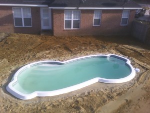Fiberglass Construction | After Setting, Backfilled | Ready for Concrete